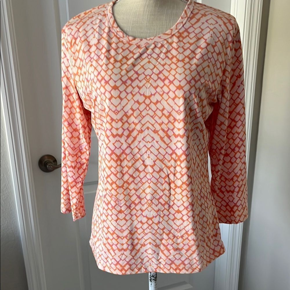Michelle Paris’s Orange /Pink 3/4 Sleeve Tee for Effortless Style